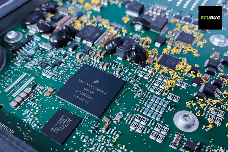 Macro close-up of an automotive ECU circuit board featuring an SPC5777 microcontroller and memory components. This detailed view illustrates the complex hardware architecture that ECUBUG tools are designed to interface with.