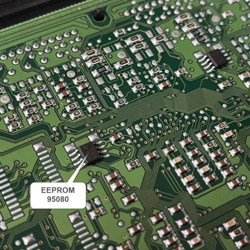 Close-up of Bosch ME7.7.0 PCB from Smart 451 ECU showing the 95080 EEPROM chip location with arrow and label, SOIC-8 package